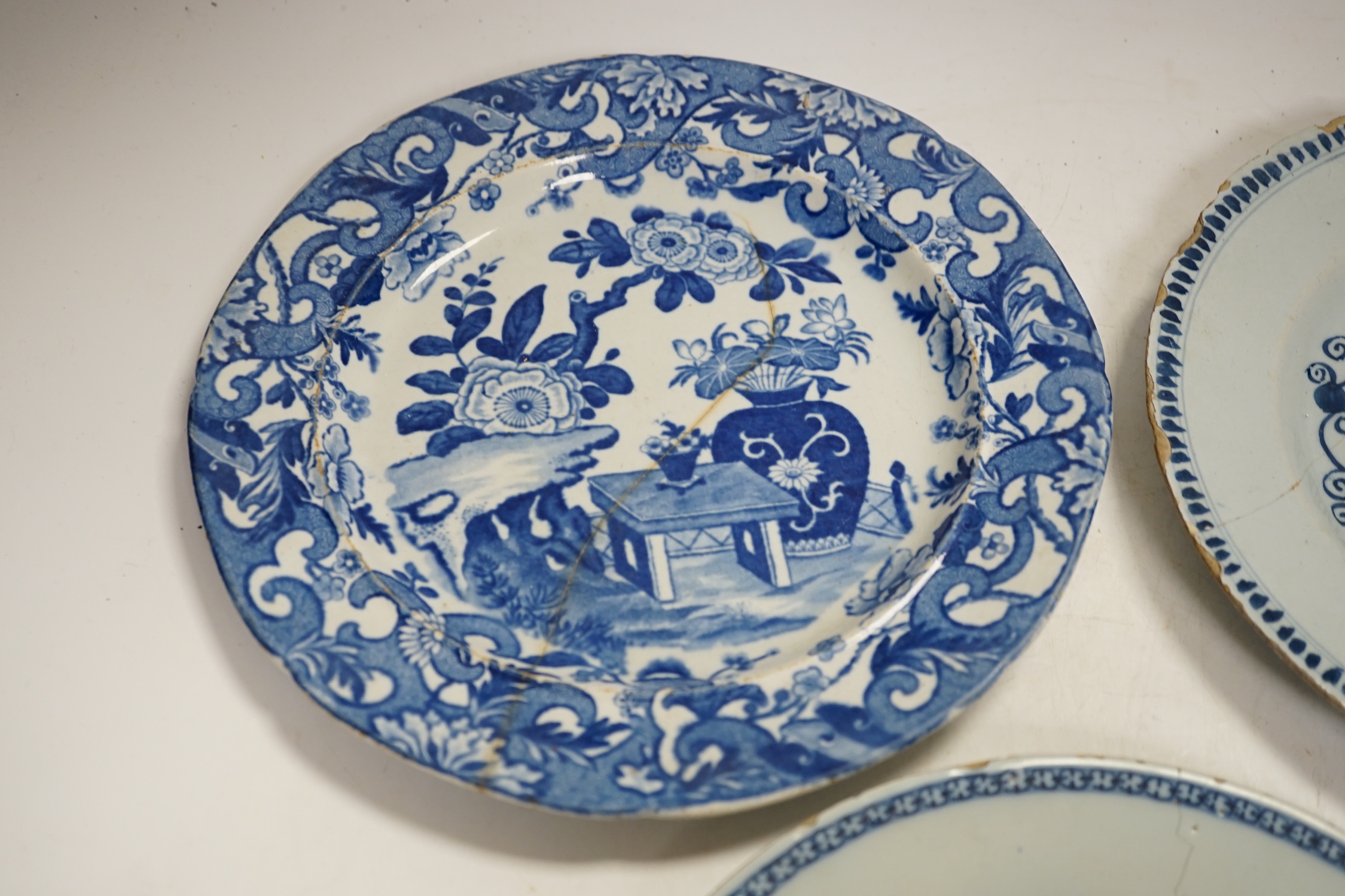 Two 18th century Delft plates and a 19th century Masons ‘Crown Inn’ plate-24cm diameter